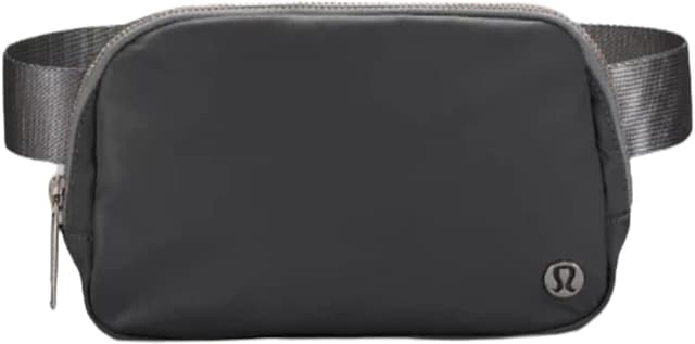 Lululemon Everywhere Belt Bag in black on a desk