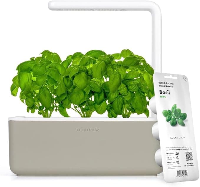 Beige Click & Grow Smart Garden with basil pods on a table