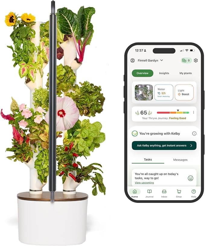 Gardyn Home Kit 3.0 hydroponic growing system filled with herbs and greens