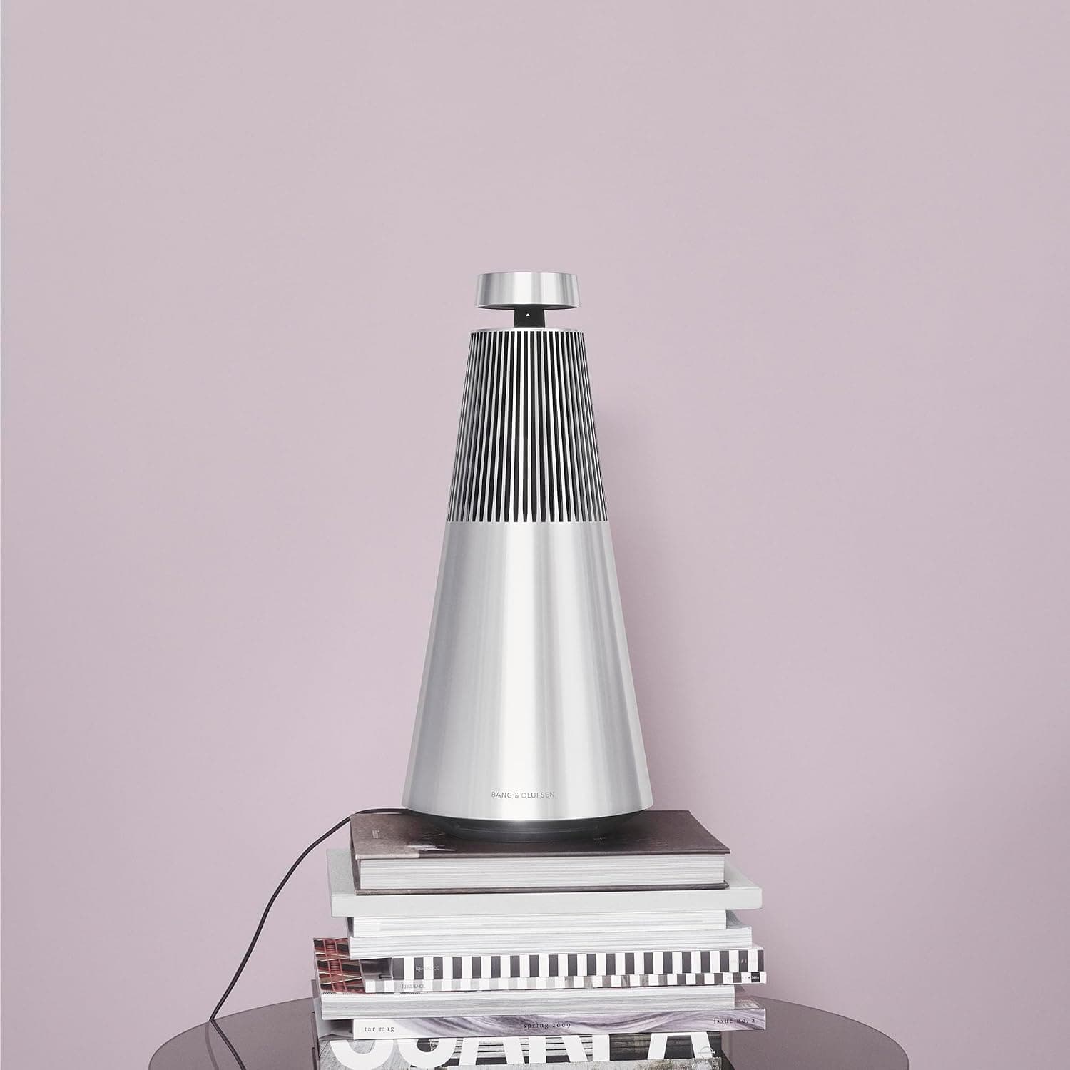 Bang & Olufsen Beosound 2 speaker on a marble side table