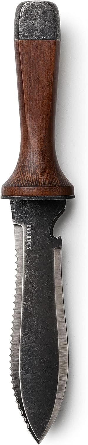 Barebones Hori Hori Ultimate Tool with walnut handle and leather sheath on a wooden table