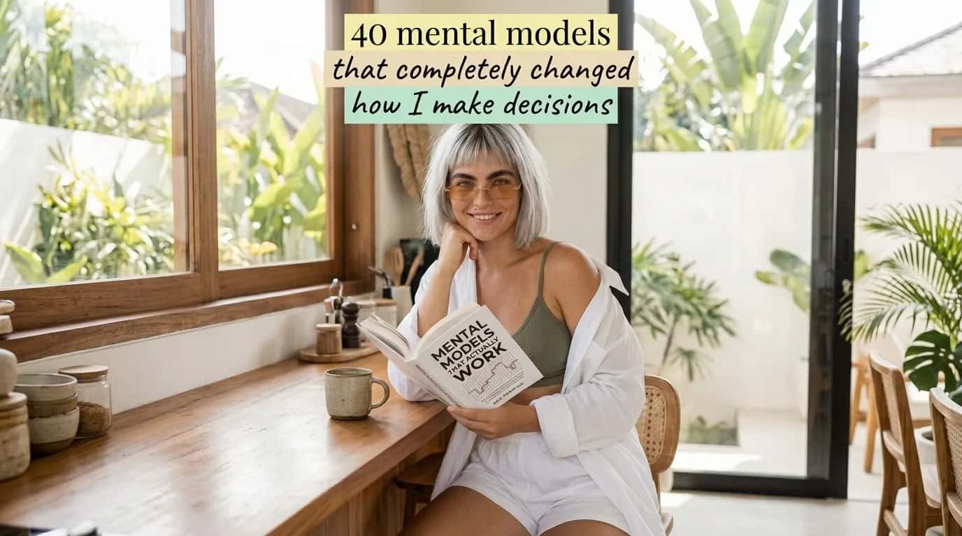 Woman reading Mental Models That Actually Work at a desk