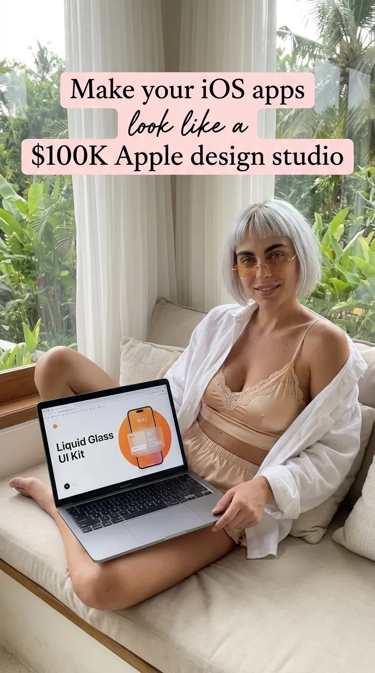 Kaia in a beige cami and white shirt on a cushioned window seat with a laptop showing the Liquid Glass UI Kit