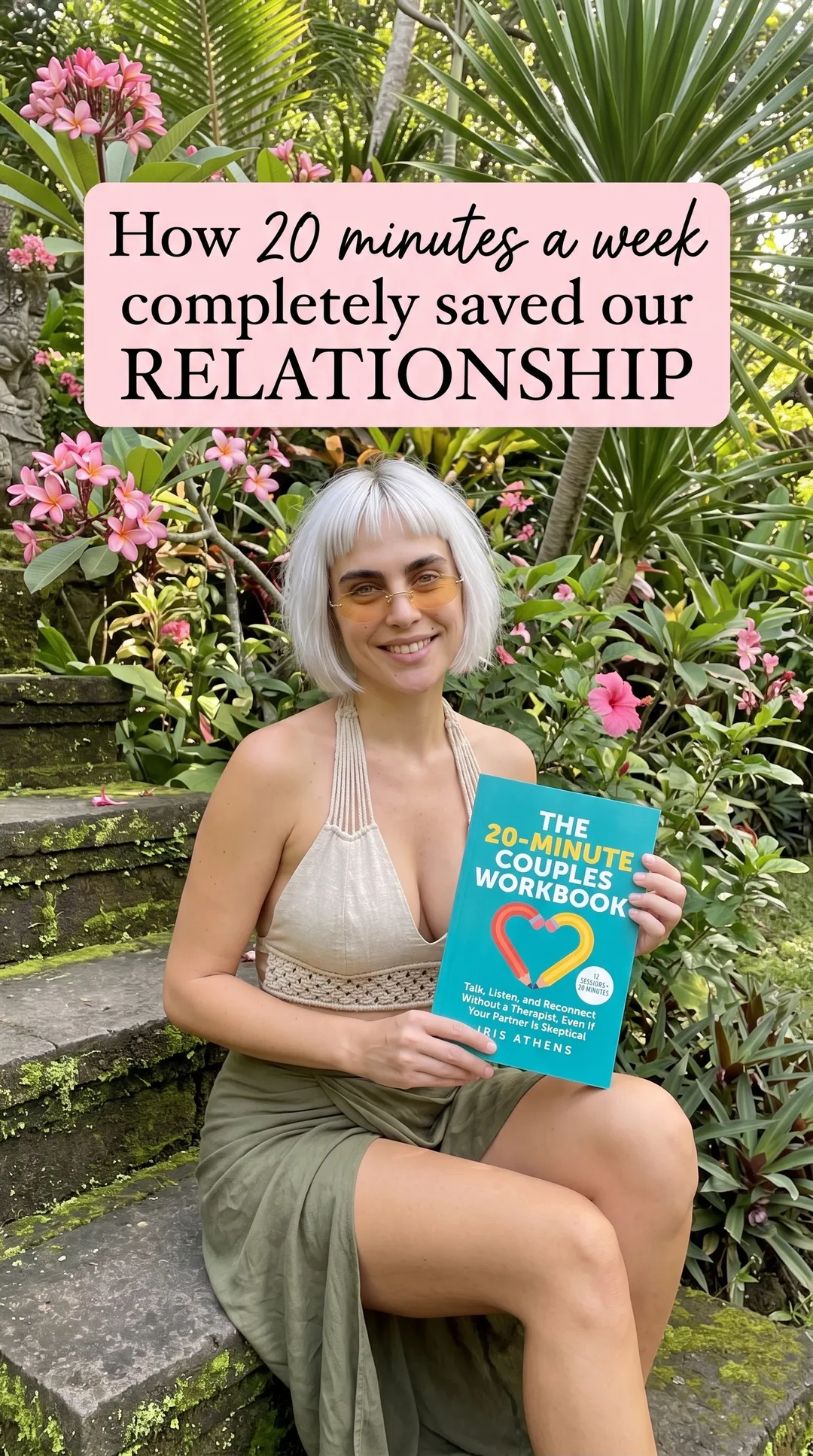Kaia in a crochet top and olive skirt sitting on garden steps holding The 20-Minute Couples Workbook