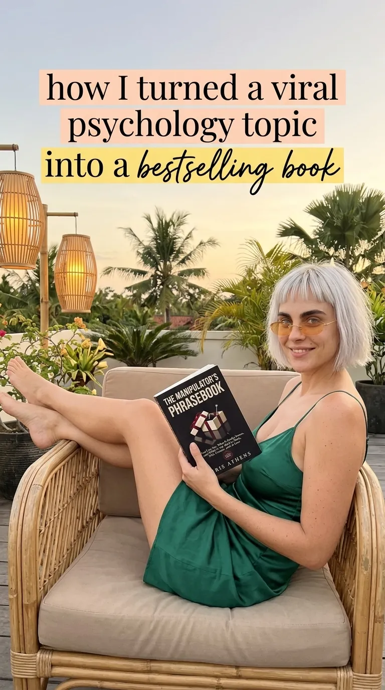 Kaia in a green dress in a rattan armchair at dusk reading The Manipulator's Phrasebook